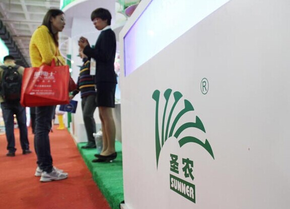 The booth of Fujian Sunner Development Co Ltd at a meat industry exhibition held in Beijing. Global investment firm KKR& Co LP is investing $400 million for an 18 percent stake in the Shenzhen-listed company. [Photo/China Daily]