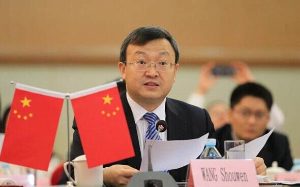 Wang Shouwen, assistant minister of China's Ministry of Commerce, speaks during the opening ceremony of the fifth round of China-Japan-Korea FTA negotiations in Beijing, capital of China, Sept 1, 2014. [Photo/Xinhua]  