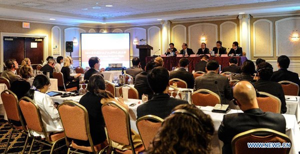 Chinese and US specialists exchange ideas on intellectual property right (IPR) protection during an event held in Washington, DC on Sept 12, 2014. At the event, Chinese officials introduced the country's recent achievements in improving its IPR system, including the amending of the Trade Mark Law and Copyright Law, and the efforts to establish specialized IPR courts in Beijing, Shanghai and Guangzhou. (Xinhua/Bao Dandan)
