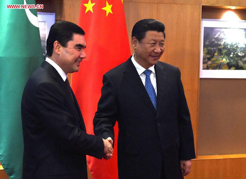 Chinese President Xi Jinping (R) meets with Turkmen President Gurbanguly Berdymukhamedov in Dushanbe, capital of Tajikistan, Sept. 12, 2014. (Xinhua/Ma Zhancheng)