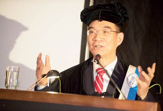 Justin Yifu Lin received an honorary doctorate from Vlerick Business School and Catholic University of Leuven in Belgium on Sept 8. CHINA DAILY