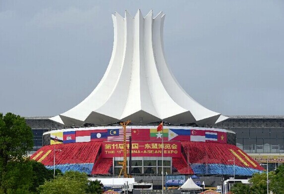 Photo taken on Sept. 16, 2014 shows the outdoor scene of Nanning International Convention and Exhibition Center in Nanning, capital of south China's Guangxi Zhuang Autonomous Region. The 11th China-ASEAN Expo kicked off here on Tuesday, with over 2,300 companies from China and the Association of Southeast Asian Nations (ASEAN) attending the event.(Xinhua/Lu Boan)