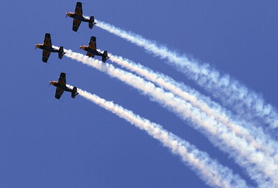 The Redbull Aerobatic Team in the air during the Third Shenyang Faku International Flight Show in Liaoning province in August. ZHU XINGXIN / CHINA DAILY