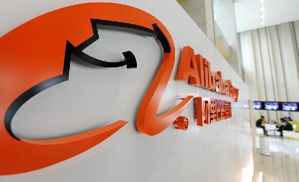 File photo taken on March 25, 2014 shows the logo of Alibaba Group in Hangzhou, east China's Zhejiang Province. Chinese e-commerce giant Alibaba Group Holding Limited on Thursday priced its stock at 68 U.S. dollars, in an initial public offering (IPO) valued at 21.8 billion dollars, a source familiar with the situation told Xinhua. (Xinhua/Ju Huanzong)