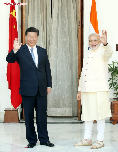 Chinese President Xi Jinping (L) holds talks with Indian Prime Minister Narendra Modi in New Delhi, India, Sept 18, 2014. (Xinhua/Yao Dawei)