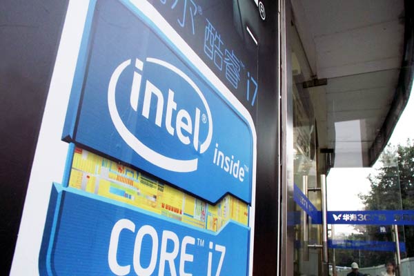 A billboard promotes global chip producer Intel Corp's products in Nanjing, Jiangsu province. Intel is reportedly spending $1.5 billion for a 20 percent stake in Chinese high-tech company Tsinghua Unigroup Ltd, the parent of Unisplendour.CHINA DAILY  