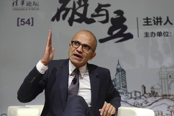Satya Nadella, chief executive officer of Microsoft Corp, speaks at a seminar at Tsinghua University in Beijing, Sept 25, 2014. Nadella is on his first visit to China as the CEO of the tech company. MAO SHUO/CHINA DAILY  
