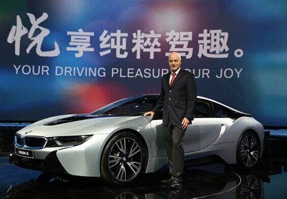 Karsten Engel, president and CEO of BMW Group Region China, unveiled the BMW i8 at the launch ceremony in Beijing on Sept 21. CHINA DAILY  