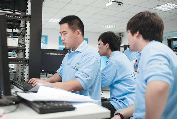 Computer science students participate in an online security contest for vocational schools in Nanjing, Jiangsu province, on June 18. Chen Yihuan / Xinhua