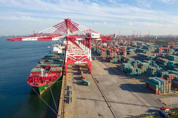 The container terminal of Tianjin port. Claiming to be the world's fourth-largest port by throughput, it handled more than 500 million metric tons of cargo last year, and hopes to do even more with its planned expansion. XINHUA  