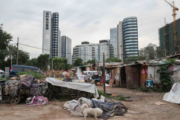 A shantytown area in Beijing. China will expand the use of municipal bonds as part of a broader plan to increase funding for its urbanization program, according to a senior PBOC official. HUA YU/CHINA DAILY  