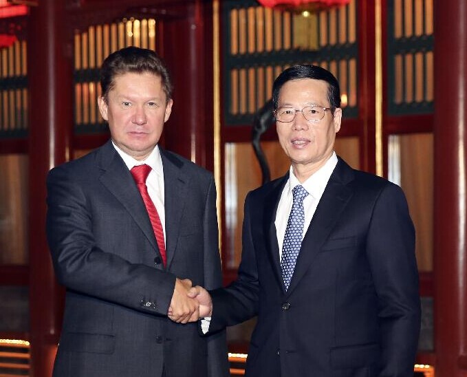Chinese Vice Premier Zhang Gaoli (R) meets with Russia's Gazprom CEO Alexei Miller in Beijing, capital of China, Oct. 10, 2014. (Xinhua/Ding Lin)