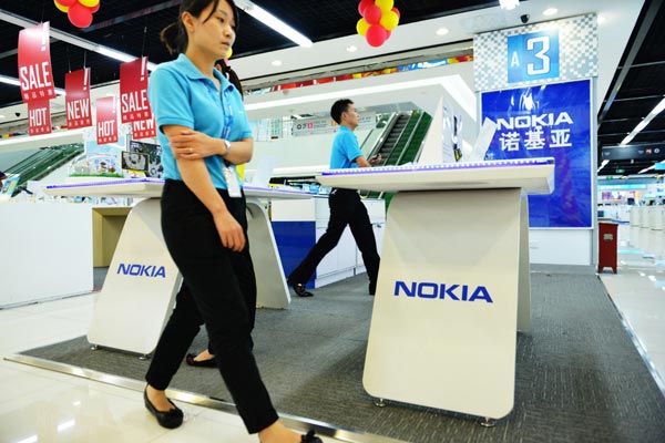 A Nokia store without customers in Hangzhou, Zhejiang province. Employees of Microsoft Corp's Nokia group in Beijing are worried about the company's massive layoff plan. [Photo/China Daily]   