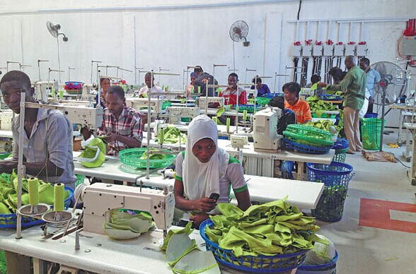 Workers at a textile factory in the Lekki Free Trade Zone in Lagos, Nigeria. [Provided to China Daily]  