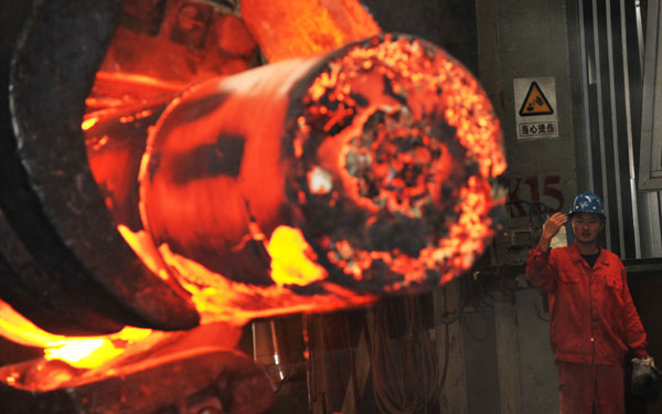 A worker at the Dalian branch of Dongbei Special Steel Group Co Ltd in October. [Provided to China Daily]  