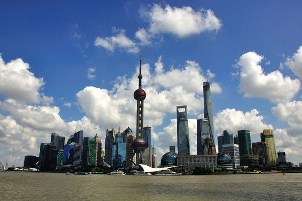 A view of the financial district from the Bund in Shanghai on Sept 20.The city has played a lead role in attracting foreign investment and is now the second headquarters for several multinational companies. Foreign consultancies like BCG have also benefited from China's rapid economic growth with a slew of business opportunities. [Provided to China Daily]  