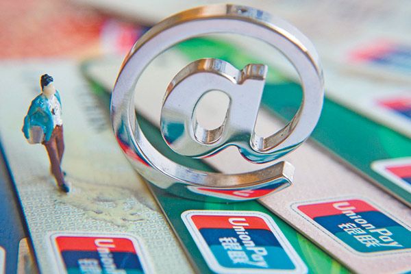 The rapid growth in e-commerce is changing people's shopping habits and the modes of financing purchases. However, the lack of proper regulation also brings huge risks to investors. [Photo / China Daily]  