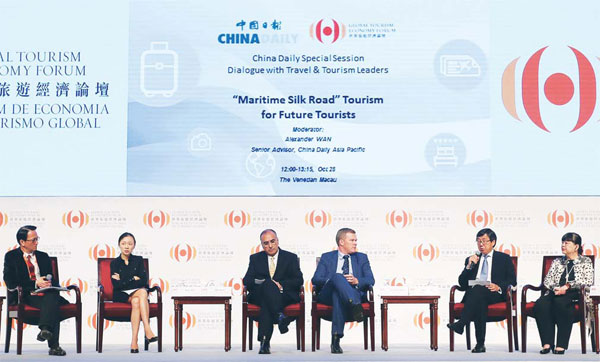 Edmond Ip (second from right), vice-chairman of the Artyzen Hospitality Group, believes there needs to be more collaboration between governments and the private sector to attract more travelers to the Asia-Pacific region during the China Daily Asia Leadership Roundtable in Macao on Oct 28. Parker Zheng / China Daily