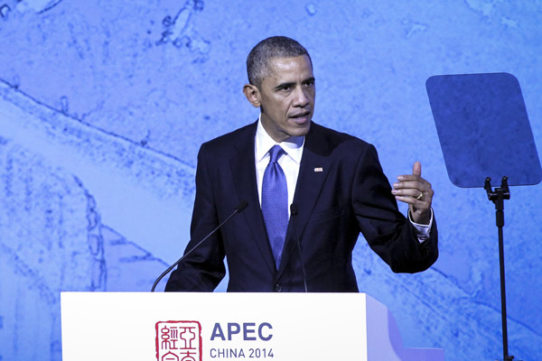US President Barack Obama delivers a keynote speech at the Asia-Pacific Economic Cooperation CEO Summit 2014 in Beijing on Monday. [Zou Hong / China Daily]  