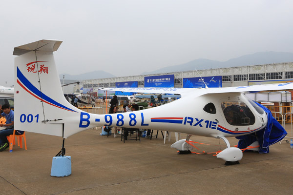 An electric RX1E aircraft is displayed at the 10th China International Aviation and Aerospace Exhibition in Zhuhai, Guangdong province, on Monday. [Ji Jianshu / China Daily]  