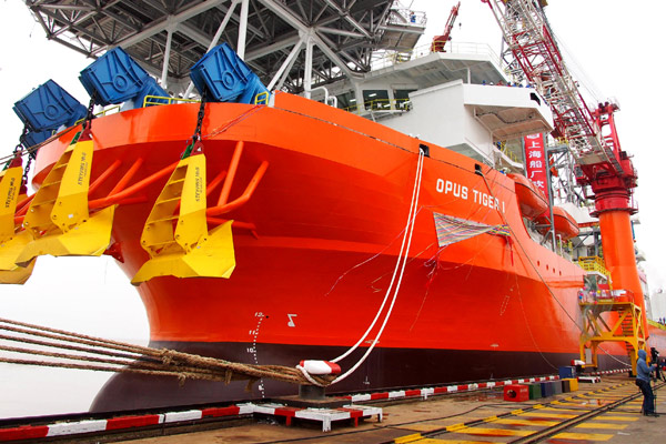 OPUS Tiger 1, China's first self-developed deep-sea drilling vessel, ready for operation in Shanghai. Chinese experts suggest policymakers to increase investment in innovation, which could prove to be an effective strategy to help unleash the country's potential. [Chen Fei / Xinhua]   