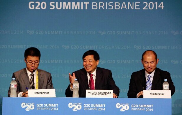 China's Vice Finance Minister Zhu Guangyao (C) holds a press conference at the G20 summit in Brisbane, Australia, on Nov. 15, 2014.(Xinhua/Zhao Danhui) 