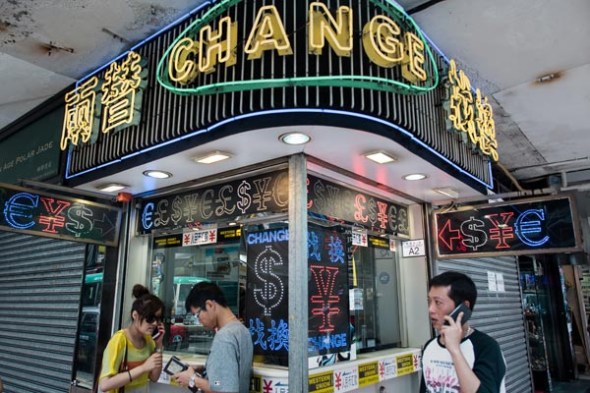A currency exchange booth in Hong Kong. The special administrative region is the world's largest offshore yuan market, where deposits of the currency have exceeded 1.1 trillion yuan, about half of the total offshore yuan globally.