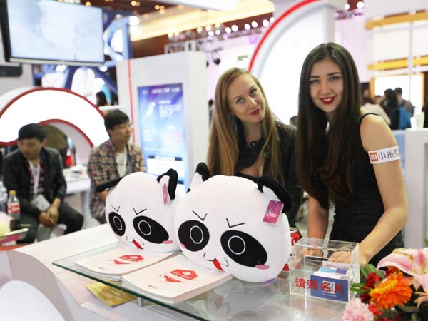 The Xiaomi Corp stand at an Internet exhibition in Beijing. The company is looking to build a stronger software ecosystem to compete against Apple Inc and Samsung Electronics Co. [Photo/CHINA DAILY]