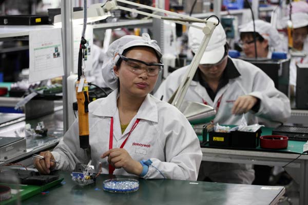A production line of Honeywell International Inc in Suzhou, Jiangsu province. The company will consider China its second headquarters for automation and control solutions activities. LI JUNFENG/CHINA DAILY