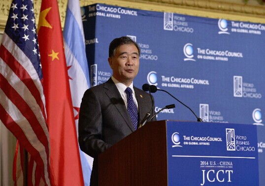Chinese Vice Premier Wang Yang addresses a forum on U.S.-China: A Shared Vision For Global Economic Leadership in Chicago, the United States, Dec. 17, 2014. Wang is in Chicago for the 25th session of the U.S.-China Joint Commission on Commerce and Trade (JCCT). (Xinhua/Yin Bogu)