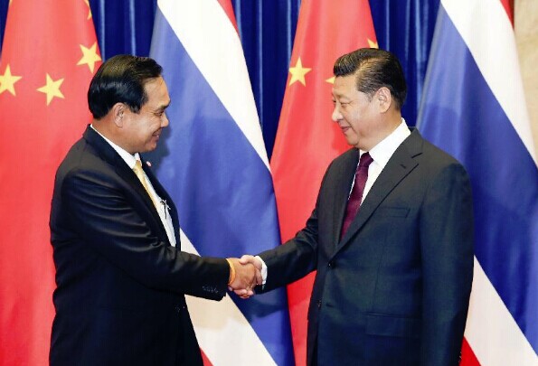 Chinese President Xi Jinping (R) meets with Thai Prime Minister Prayuth Chan-ocha in Beijing, capital of China, Dec. 23, 2014. (Xinhua/Ding Lin)