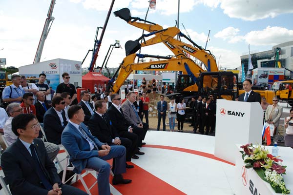 A recent products promotion by Sany Heavy Industry Co Ltd in Moscow, Russia. The company is planning to increase its investments in emerging markets, as the heavy machinery maker seeks ways to sustain growth amid tough market conditions at home. [Photo/Xinhua]  