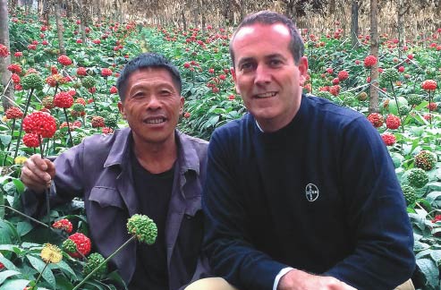 Rob Hulme, head of Bayer CropScience's China division, works with local governments to provide advice on sustainable farming methods. [Provided to China Daily]  