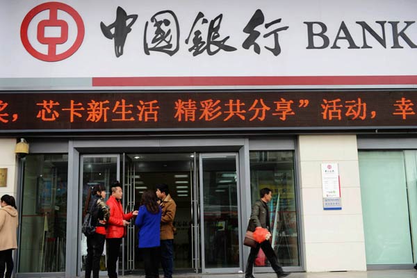 A branch of Bank of China Ltd in Qingdao, Shandong province. The bank is planning to extend credit of no less than $20 billion to the projects relating to One Belt and One Road initiatives in 2015. YU FANGPING/CHINA DAILY  