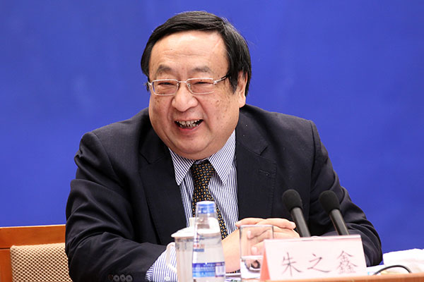 Zhu Zhixin, vice-chairman of the National Development and Reform Commission, speaks at the first weekly policy briefing of the State Council in Beijing, Jan 16, 2015.[Photo by Zou Hong/english.gov.cn]  