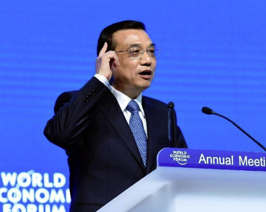 Chinese Premier Li Keqiang delivers a keynote speech at the World Economic Forum (WEF) annual meeting in Davos, Switzerland, on Jan. 21, 2015. (Xinhua/Rao Aimin)