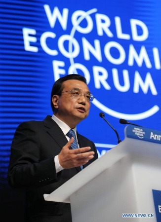 Chinese Premier Li Keqiang delivers a keynote speech at the World Economic Forum (WEF) annual meeting in Davos, Switzerland, on Jan. 21, 2015. (Xinhua/Liu Weibing)