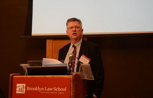 William Perry, partner of Dorsey & Whitney LLP, speak at Brooklyn Law School on Jan 21 in New York. Lu Huiquan / For China Daily