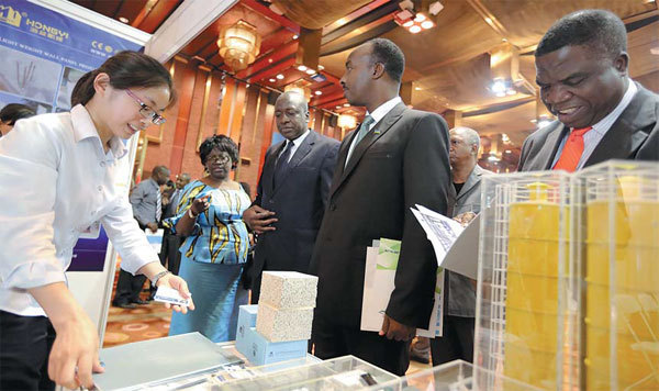 African businessmen attend the China-Africa Investment Forum held in Beijing in July, 2014. Business exchanges between China and Africa are growing more frequent. [Photo provided to China Daily]