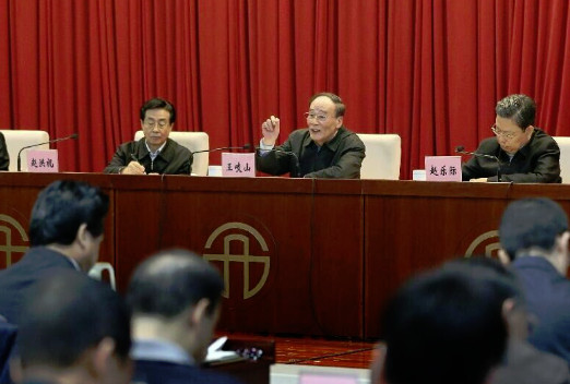 Wang Qishan (2nd R), a member of the Standing Committee of the Political Bureau of the Communist Party of China (CPC) Central Committee and secretary of the CPC Central Commission for Discipline Inspection, addresses a conference on the work of central-level Party inspection in Beijing, China, Feb. 11, 2015. (Xinhua/Ma Zhancheng) 