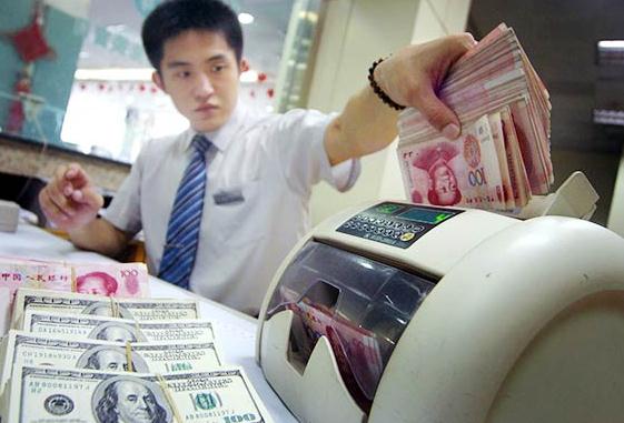 Academic says it is wrong for China to strive for rapid renminbi internationalization without questioning its effect on the Chinese economy. [Photos provided to China Daily]  