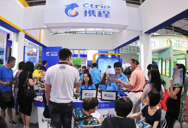 The booth of Ctrip, China's largest online travel agency in terms of market share, at a recent tourism expo in Guangzhou, capital of Guangdong province. The sales and marketing costs of Ctrip stood at about $97 million in the third quarter of 2014, a 25 percent year-on-year growth. (Provided to China Daily)