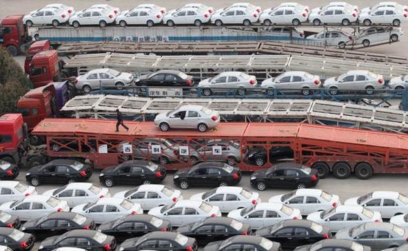 Chinese automaker Geely saw its 2014 sales drop 22.5 percent from the previous year. Domestic companies are urged to be cautious of expansion due to the lackluster market performance. (Photo: China Daily/Pan Kanjun)