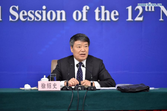Xu Shaoshi, head of China's National Development and Reform Commission, gives a press conference for the third session of China's 12th National People's Congress (NPC) on the economic situation and macro-economic control in Beijing, capital of China, March 5, 2015. The third session of China's 12th NPC opened in Beijing on March 5. (Xinhua/Li Xin)