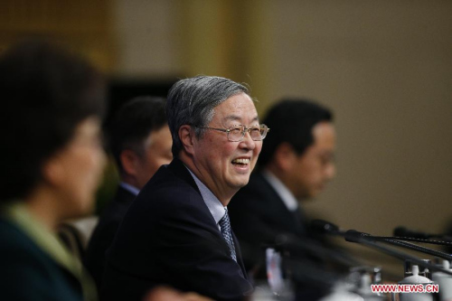 Zhou Xiaochuan, governor of the People's Bank of China, attends a press conference for the third session of the 12th National People's Congress (NPC) on financial reform in Beijing, capital of China, March 12, 2015. (Xinhua/Yin Gang)