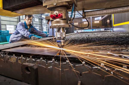 Elevator fittings being produced at a company in Lianyungang city, Jiangsu province. (Photo/Provided to China Daily)