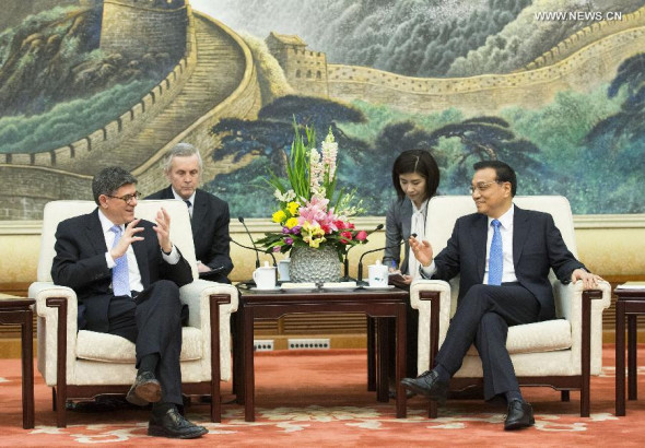 Chinese Premier Li Keqiang (R) meets with Treasury Secretary of the United States Jacob Lew in Beijing, capital of China, March 30, 2015. (Xinhua/Huang Jingwen) 