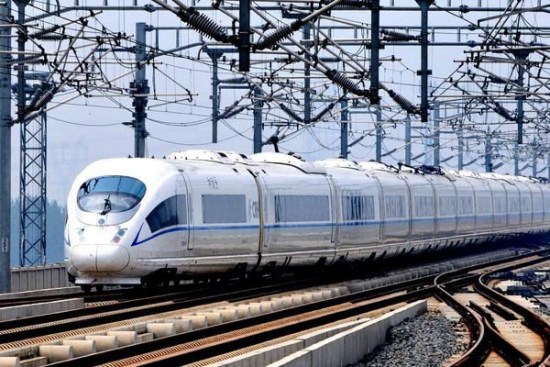 A CRH train that runs on the Beijing-Shanghai High-Speed Railway leaves Tianjin South Railway Station in North China's Tianjin, June 30, 2012. (Photo/Xinhua)  