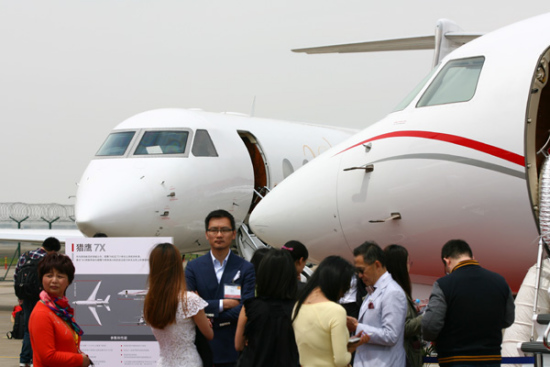 Dassault Falcon 7X business jets are on display at the 2015 Asian Business Aviation Conference and Exhibition in Shanghai. Chinese billionaires are the major buyers of luxury business jet aircraft in the world market. (Photo/China Daily)
