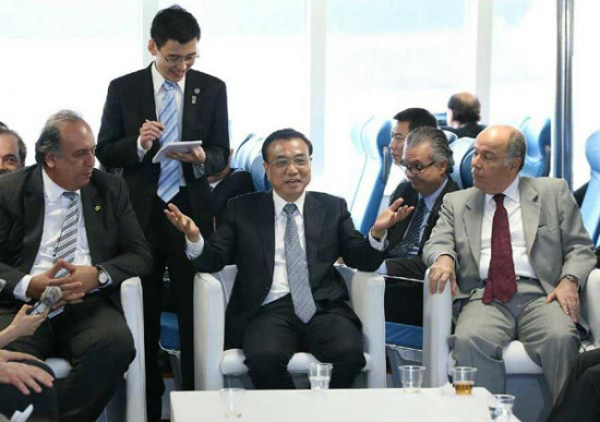 Premier Li meets with over 20 Chinese and Brazilian entrepreneurs on a China-made ferry in Rio de Janeiro on May 20. (Photo/english.gov.cn)
